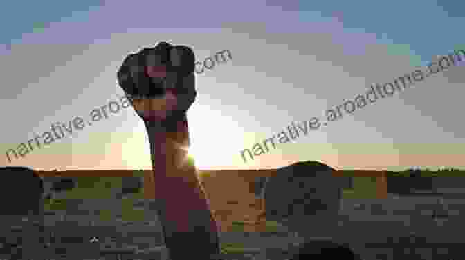 A Man With A Raised Fist, Symbolizing The Potential For Violence Within Human Nature Human Time Bomb: The Violence Within Our Nature